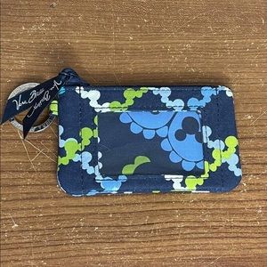 Vera Bradley zip up id case in Mickey print.